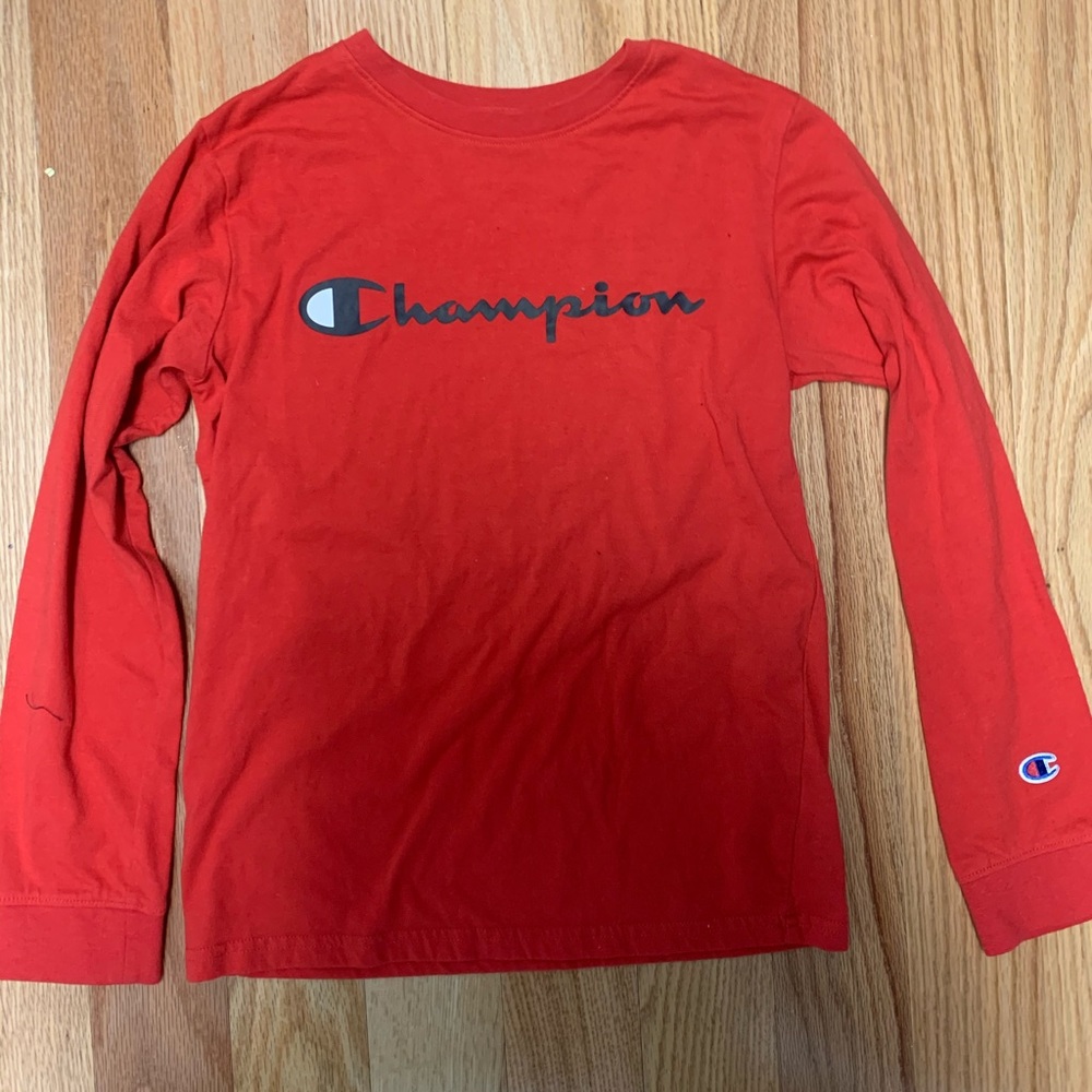champions tee